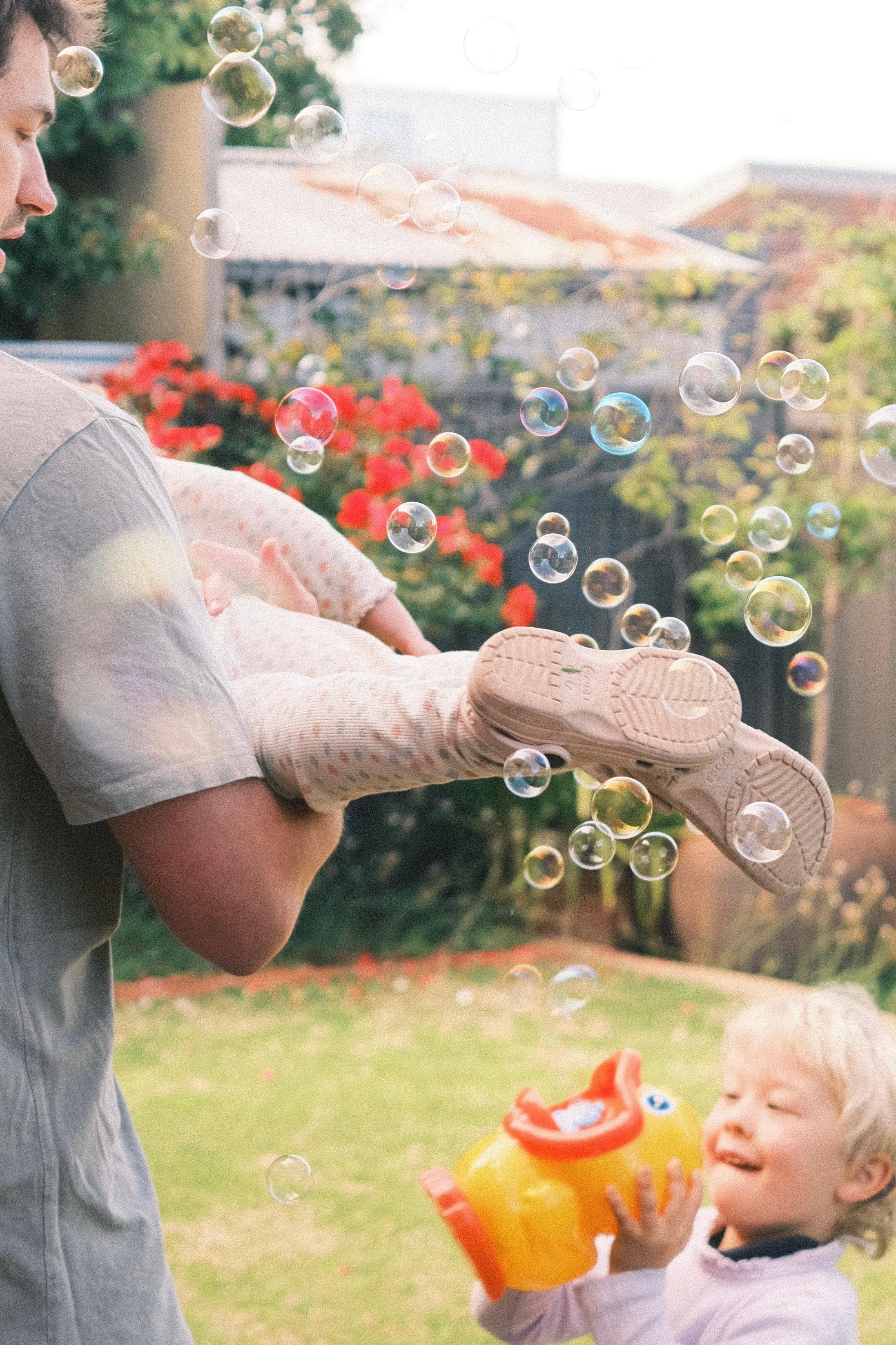 Image of kids playing with bubbles